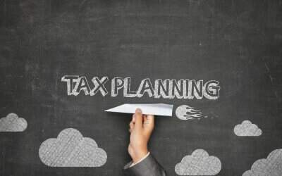 How to Invest Business Profits to Decrease Tax Obligations